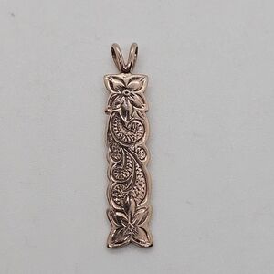 rose gold tone floral vertical bar pendant